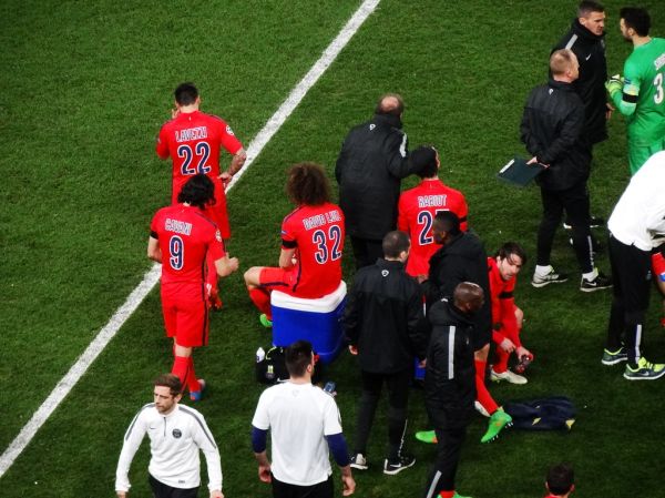 PSG players Ezequiel Lavezzi, Edinson Cavani, David Luiz and Adrien Rabiot takea brief rest after their Champions League
