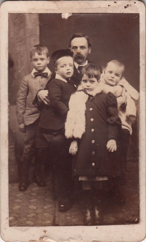 Dad has his hands full by J. Cole (c.1900)