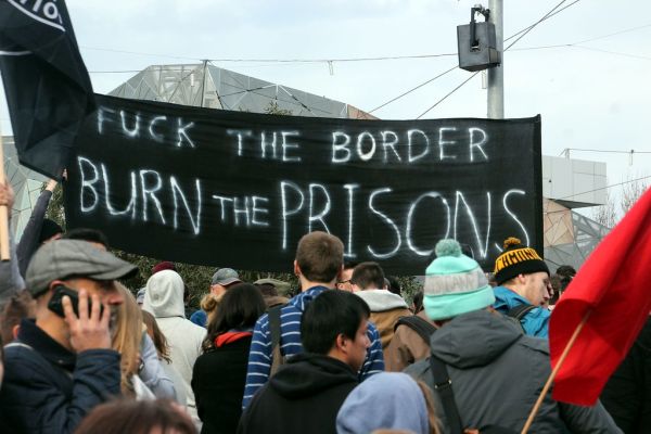 Fuck the border burn the prisons banner - Refugee Action protest 27 July 2013 Melbourne
