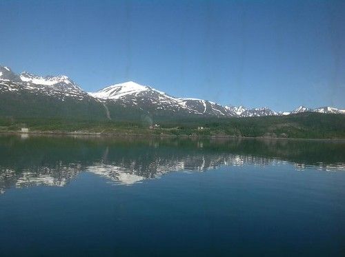 Snow-Capped Mountains Reflected in the Water - Norway Land of the Midnight Sun Tour