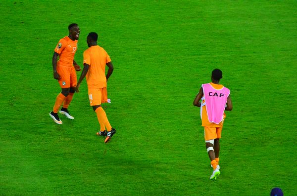 Serge Aurier and unused substitute Ismael Diomande screaming in joy at winning the African Nations Cup