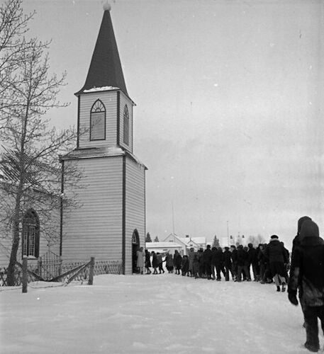Indian Residential School students in Moose Factory Island attend St. Thomas Anglican Church, Ontario, January 1946 / En