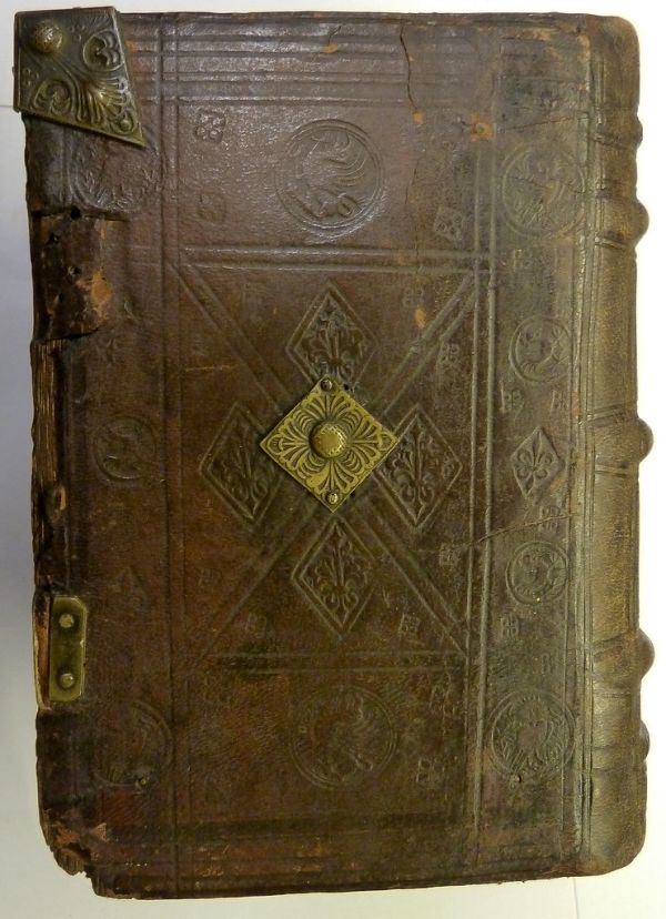 Binding: full contemporary blind-tooled leather over beveled-edge wooden boards