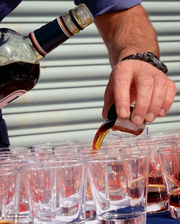 Pouring Tots of Rum for Royal Navy Splice the Mainbrace