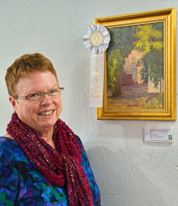 Susi with her 3rd Place Painting at TPAPS show