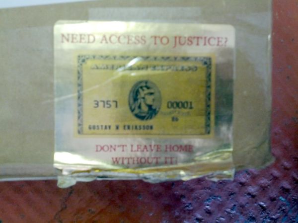 Need Access to Justice Amex sticker, Public Resource's big box of standards, the office, Hackney, London, UK.jpg