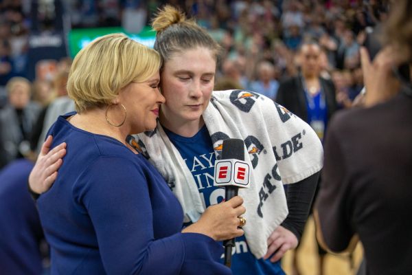 Holly Rowe gets a hug from Lindsay Whalen after the Lynx vs Mystics game. The game was Whalen's final regular season gam