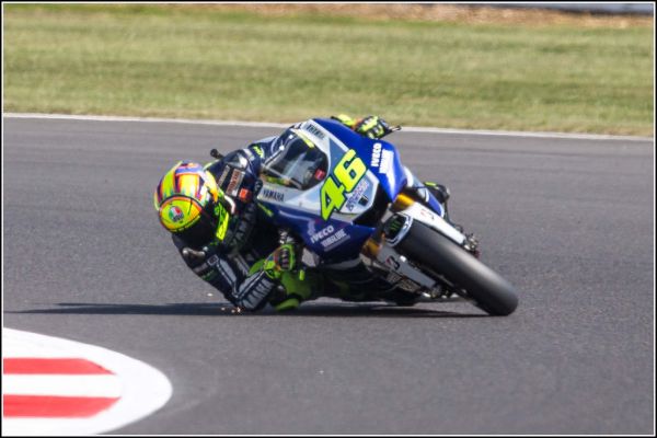 Valentino Rossi #46 with sparks from his elbow protector - Pity about the poor photo!