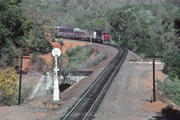 SP 9372 with Amtrak Train 5, SFZ, near Applegate, CA. WB on #1 Track crossing over the #2 Track at Tunnel 26, in Novembe