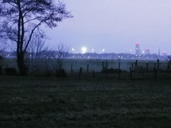 Cambuur stadium and the Achmea tower in Leeuwarden (seen from Gysjerk)