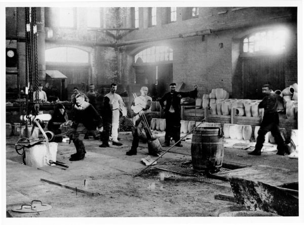 Workers in the Midvale Steel Company crucible melting shop, ca. 1887